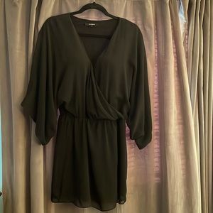 Olivaceous Black V Neck Mini Dress
